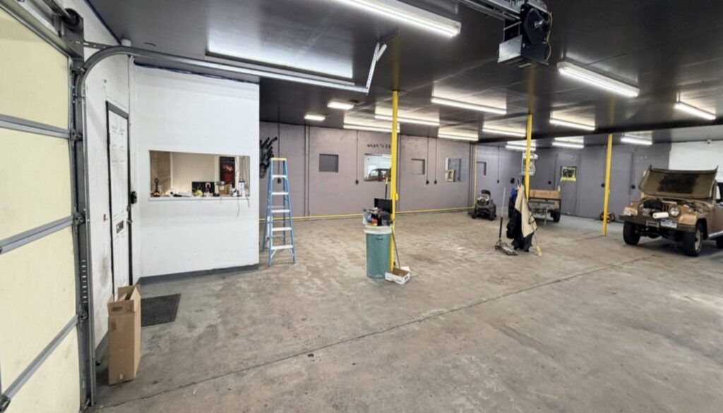 1460 Brentwood St - open service bay interior with drive-in door
