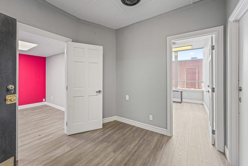 Interior of Suite 103B at 8790 W Colfax Ave, a 400 square foot ground-floor suite with a kitchen and half bath