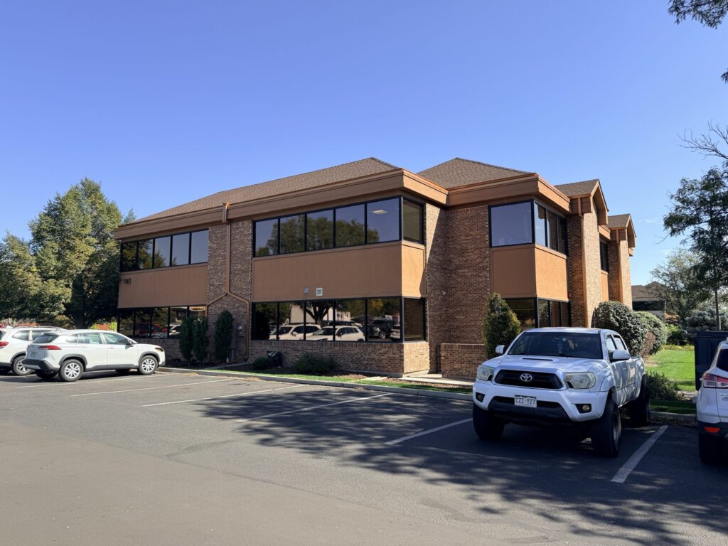 East side of the building with surface parking